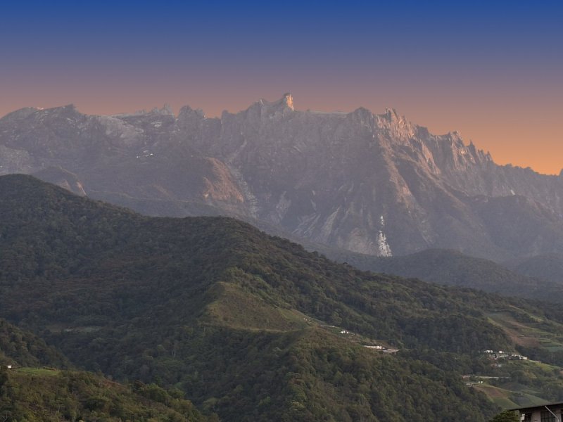The same view with a deep blue and orange sky