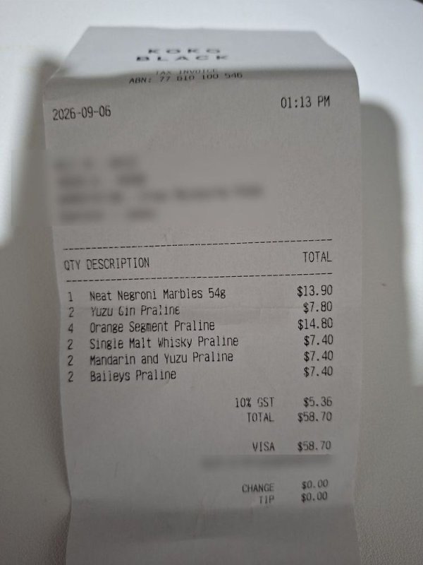 Photo of the genuine receipt, total $58.70